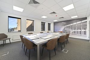 Create Business Hub - Brentwood Office Space For Rent - meeting room with motorbike decor