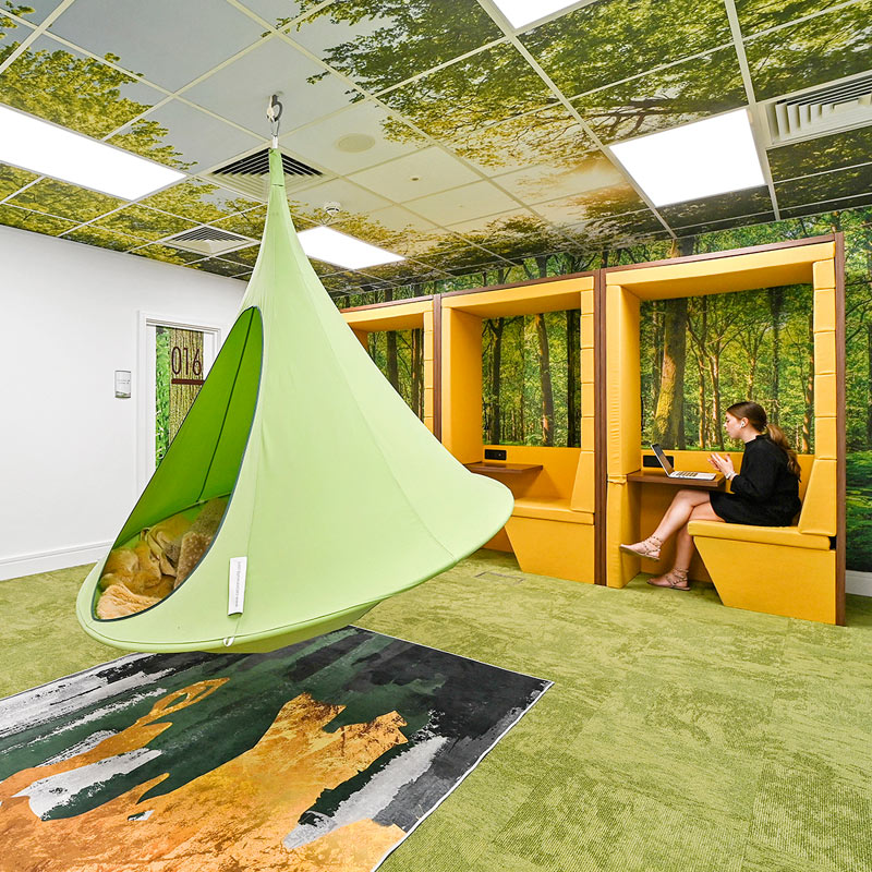 Create Business Hub - Coworking space brentwood - communal area with desk booths and hanging chair